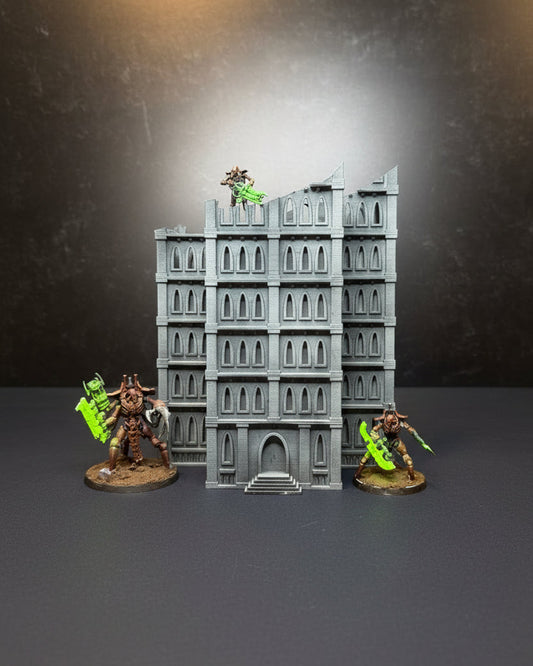 Sci-fi ruined gothic apartment building terrain with miniatures for tabletop wargaming