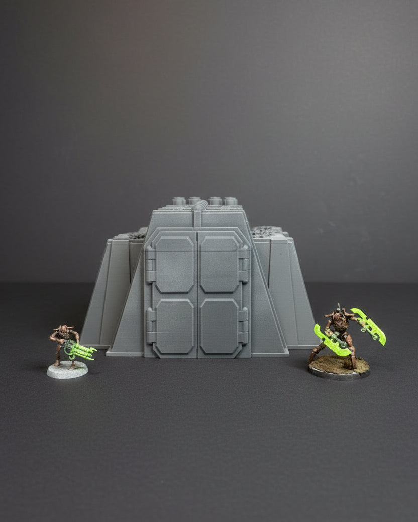 Sci-fi ruined mech factory terrain with miniatures for tabletop wargaming